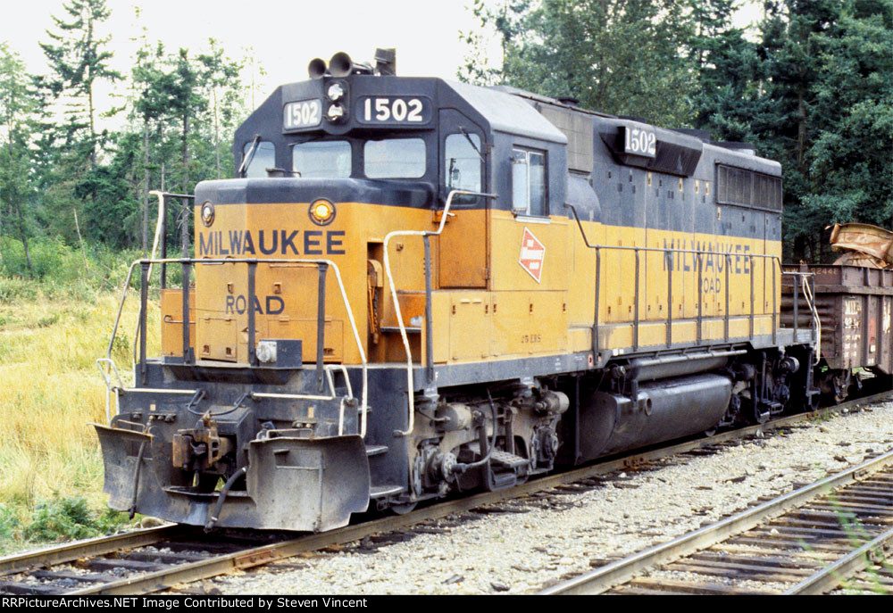 Milwaukee Road GP35 #1502 with MW train.